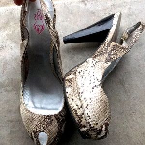Torrid snake heels 🐍